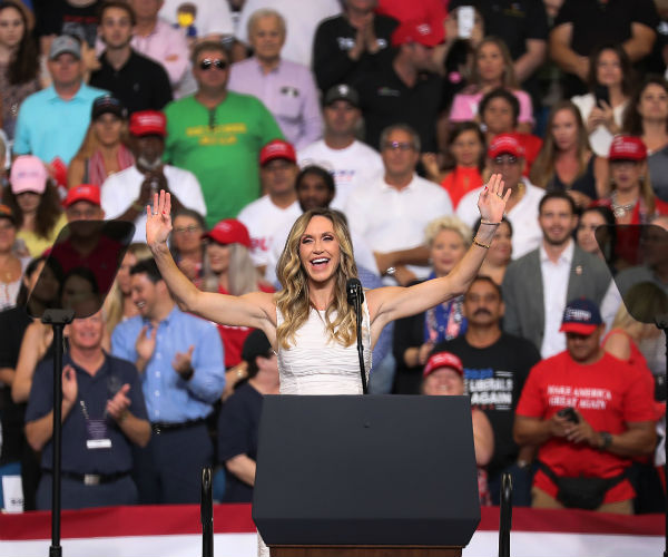 lara trump speaks to a crowd of turmp supporters at a rally