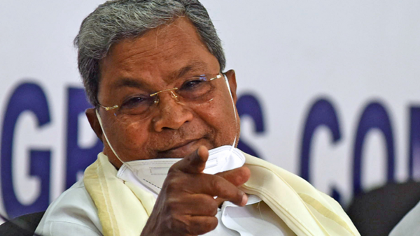 Police officers troubling Congress will be taught a lesson, says Siddaramaiah