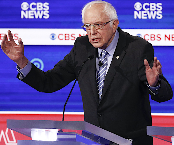 bernie sanders exults during a democratic presidential primary debate